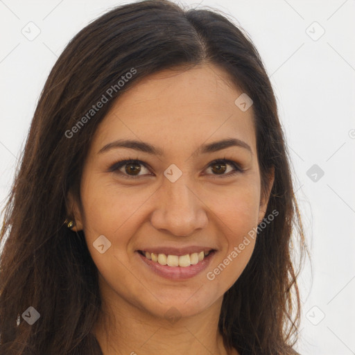 Joyful latino young-adult female with long  brown hair and brown eyes