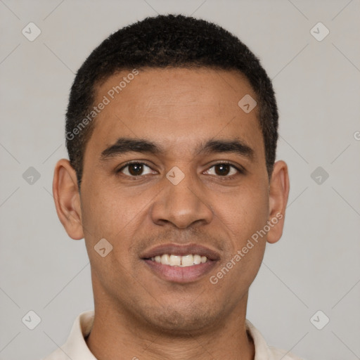 Joyful latino young-adult male with short  black hair and brown eyes