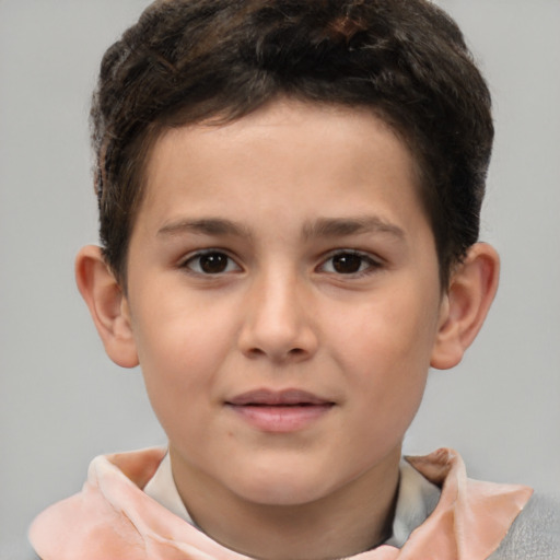 Joyful white child male with short  brown hair and brown eyes