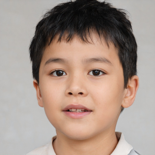 Neutral asian child male with short  brown hair and brown eyes