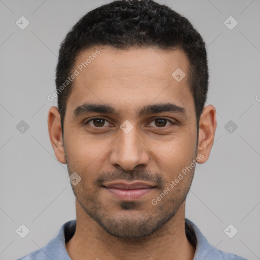 Joyful latino young-adult male with short  black hair and brown eyes