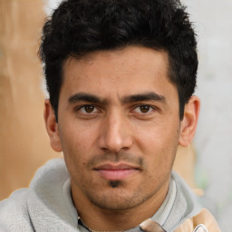 Neutral white young-adult male with short  black hair and brown eyes