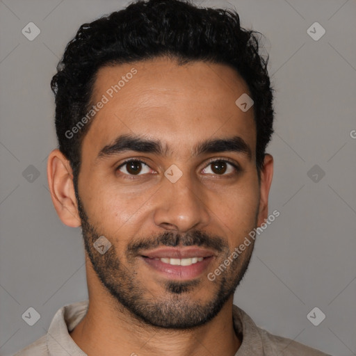 Joyful latino young-adult male with short  black hair and brown eyes