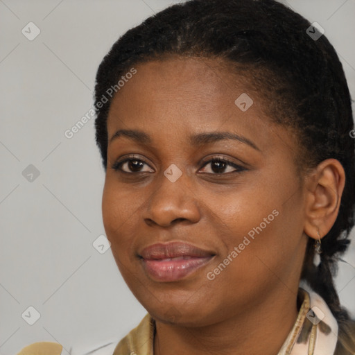 Joyful black young-adult female with medium  black hair and brown eyes