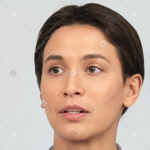 Neutral white young-adult female with short  brown hair and brown eyes