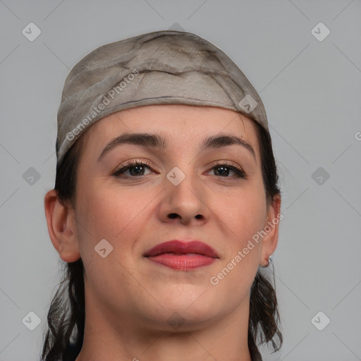 Joyful white young-adult female with medium  brown hair and grey eyes