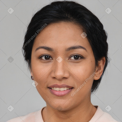 Joyful latino young-adult female with medium  black hair and brown eyes