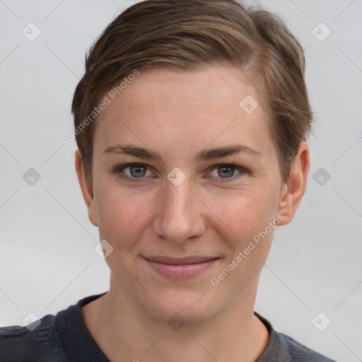 Joyful white young-adult female with short  brown hair and grey eyes