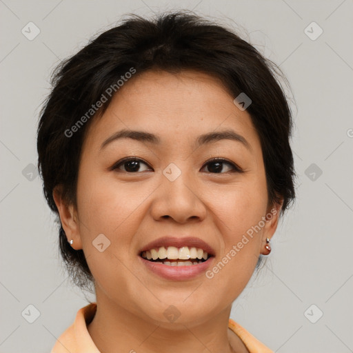 Joyful asian young-adult female with short  brown hair and brown eyes