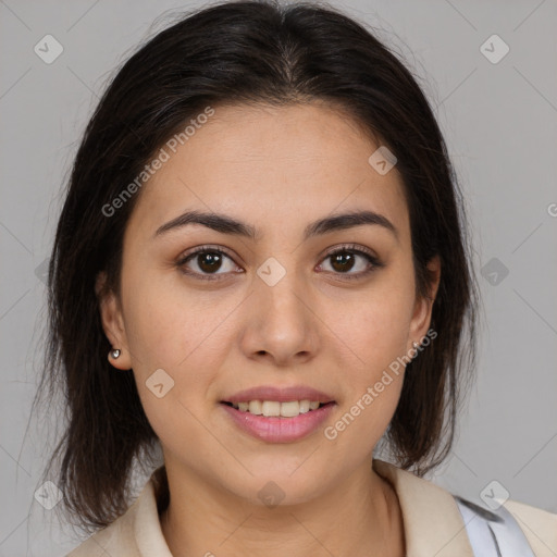 Joyful latino young-adult female with medium  brown hair and brown eyes