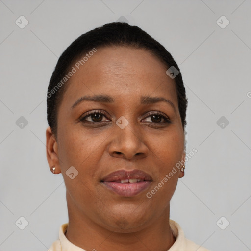 Joyful black young-adult female with short  brown hair and brown eyes