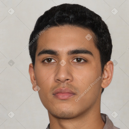Neutral latino young-adult male with short  black hair and brown eyes
