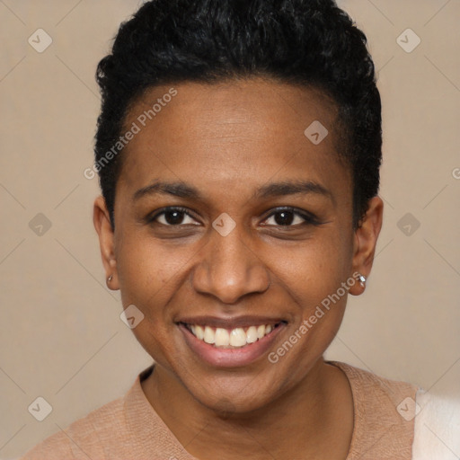 Joyful black young-adult female with short  brown hair and brown eyes