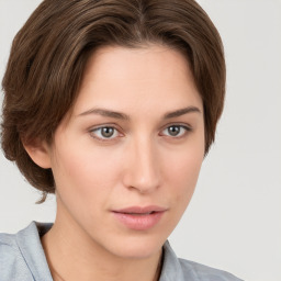 Neutral white young-adult female with short  brown hair and brown eyes