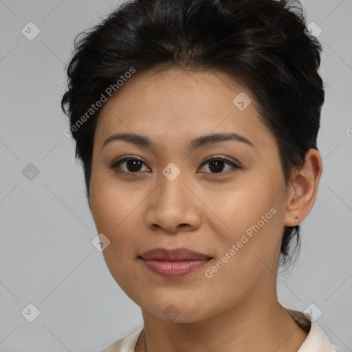 Joyful asian young-adult female with short  brown hair and brown eyes