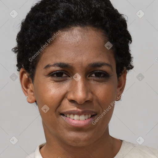 Joyful black young-adult female with short  brown hair and brown eyes