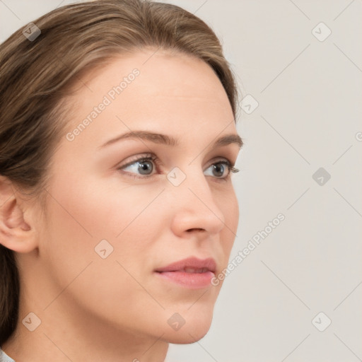 Neutral white young-adult female with medium  brown hair and grey eyes