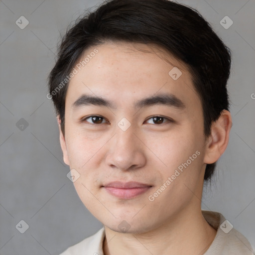 Joyful white young-adult male with short  black hair and brown eyes