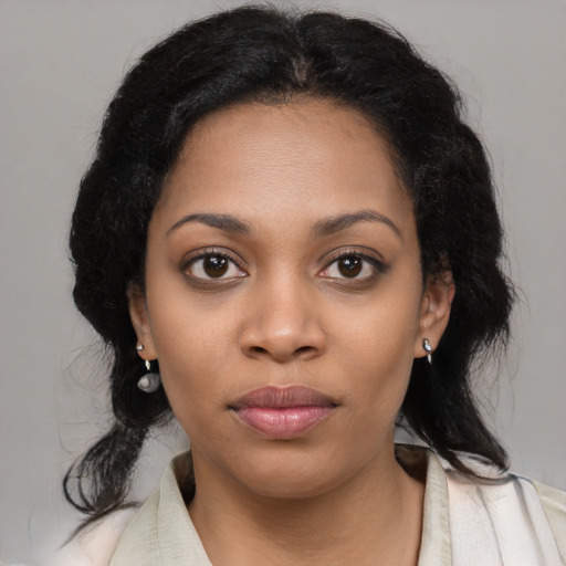 Neutral black young-adult female with medium  black hair and brown eyes