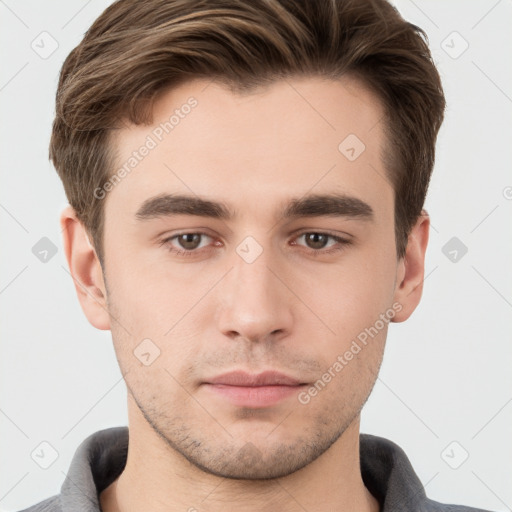 Neutral white young-adult male with short  brown hair and brown eyes