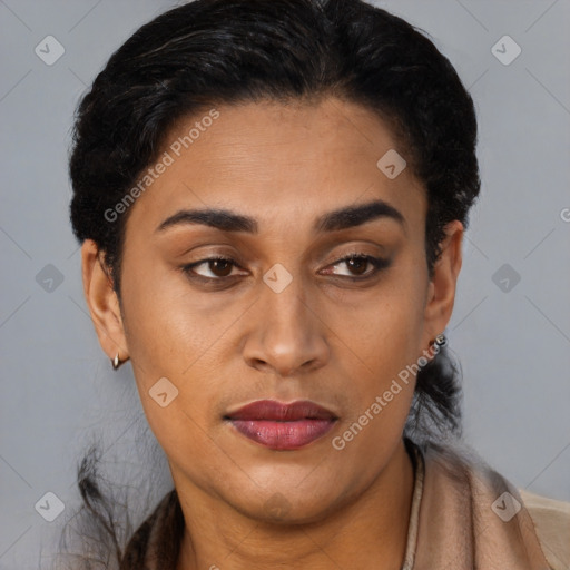 Joyful latino young-adult female with short  black hair and brown eyes