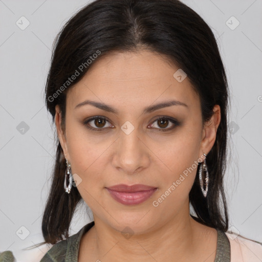 Joyful latino young-adult female with medium  brown hair and brown eyes