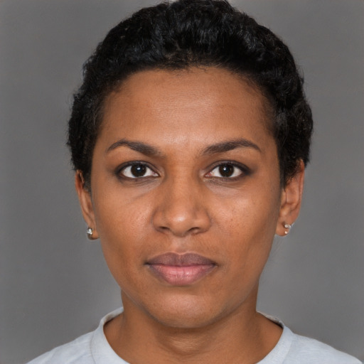 Neutral black young-adult female with short  black hair and brown eyes