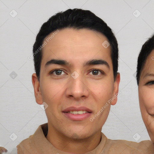 Joyful white young-adult male with short  black hair and brown eyes