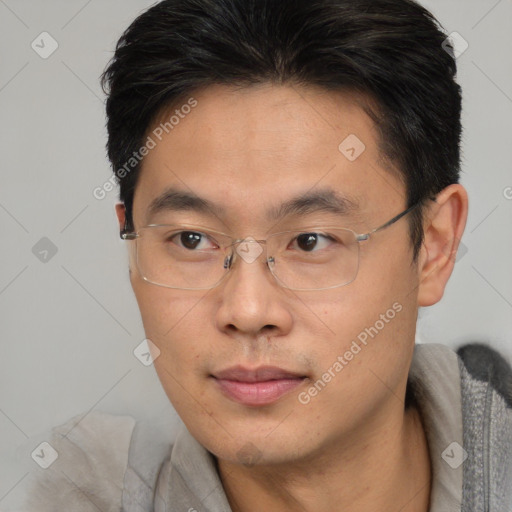 Neutral asian adult male with short  brown hair and brown eyes