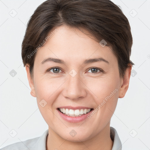 Joyful white young-adult female with short  brown hair and brown eyes