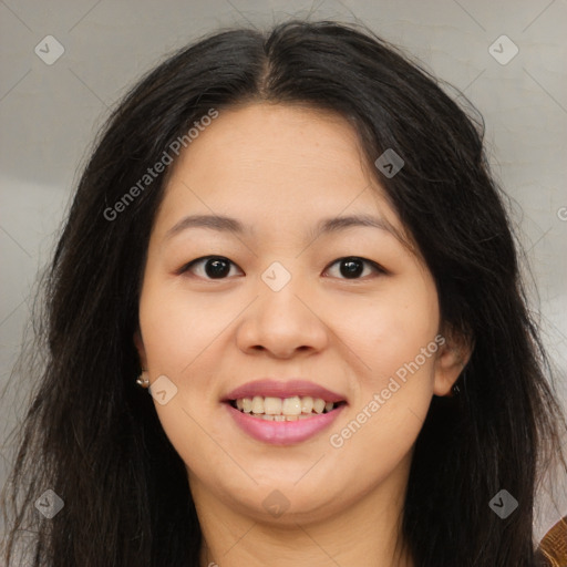 Joyful asian young-adult female with long  brown hair and brown eyes