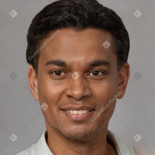 Joyful latino young-adult male with short  black hair and brown eyes