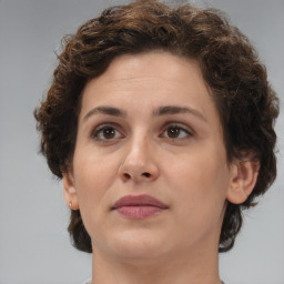 Neutral white young-adult female with short  brown hair and brown eyes