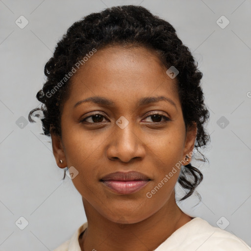 Joyful black young-adult female with medium  brown hair and brown eyes