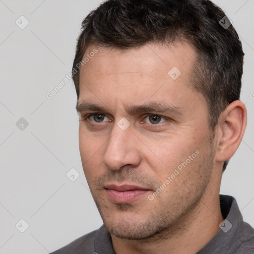 Neutral white adult male with short  brown hair and brown eyes