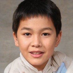Joyful white child male with short  brown hair and brown eyes