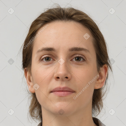 Neutral white young-adult female with medium  brown hair and brown eyes