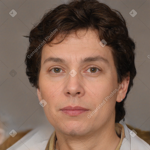 Joyful white adult male with medium  brown hair and brown eyes