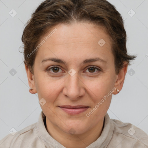 Joyful white adult female with short  brown hair and brown eyes