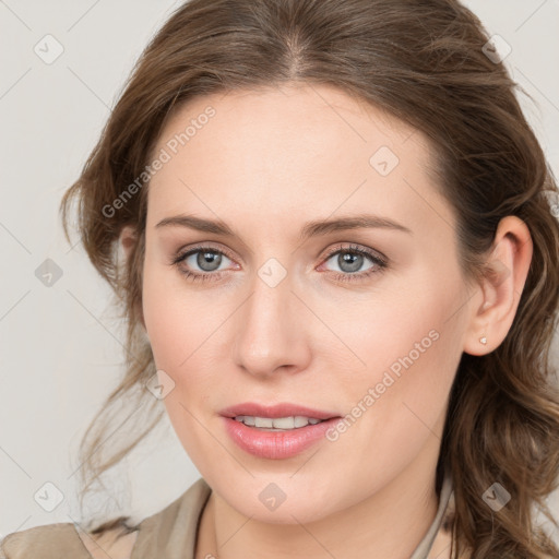 Joyful white young-adult female with medium  brown hair and blue eyes