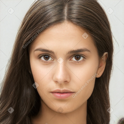 Neutral white young-adult female with long  brown hair and brown eyes