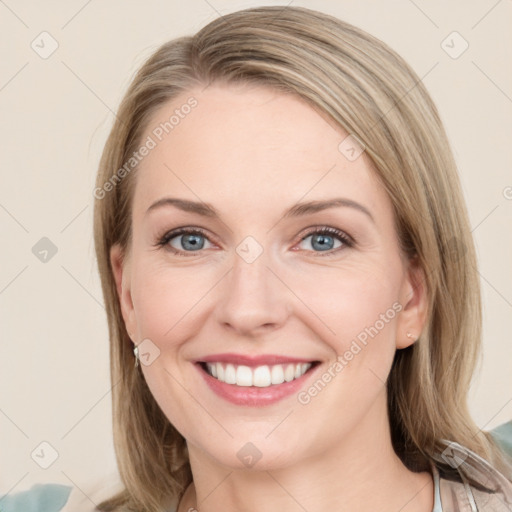 Joyful white young-adult female with medium  brown hair and green eyes