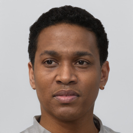Neutral black young-adult male with short  black hair and brown eyes