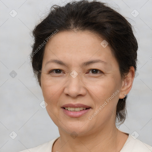 Joyful white adult female with short  brown hair and brown eyes