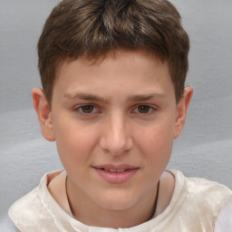 Joyful white child male with short  brown hair and brown eyes