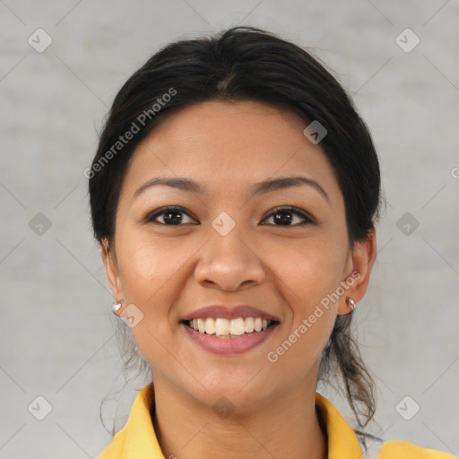 Joyful asian young-adult female with medium  black hair and brown eyes