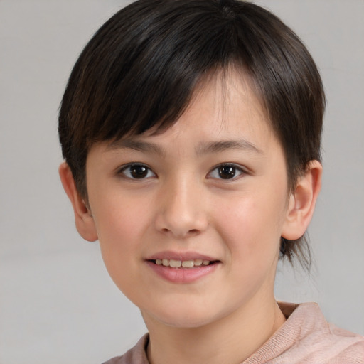Joyful white child female with short  brown hair and brown eyes