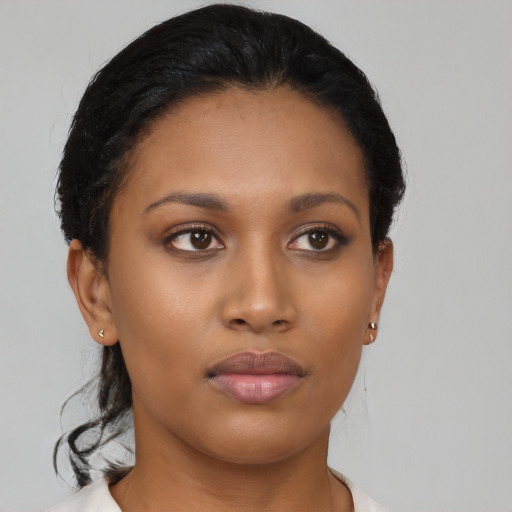 Neutral latino young-adult female with short  black hair and brown eyes