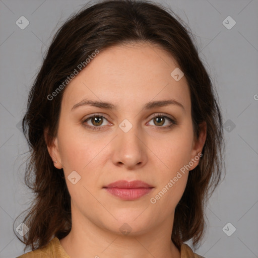 Joyful white young-adult female with medium  brown hair and green eyes