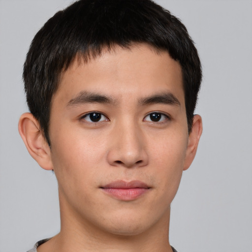 Neutral asian young-adult male with short  brown hair and brown eyes